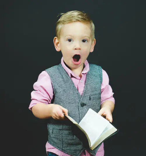 Child with Signed Book - Ben White